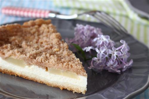 Tasty pear cheesecake on the plate